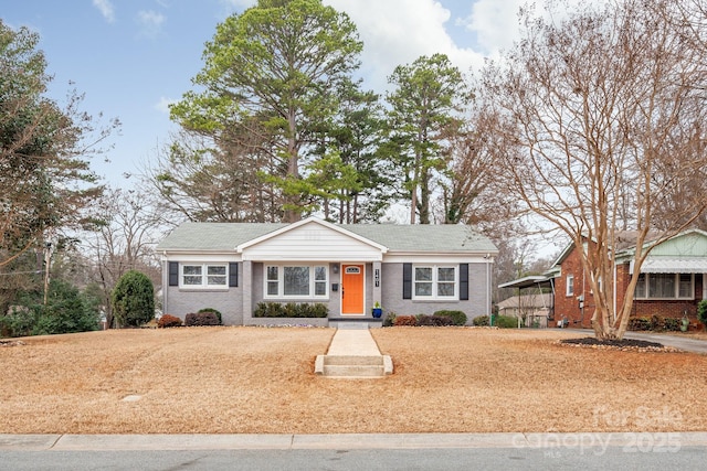 ranch-style house with a carport