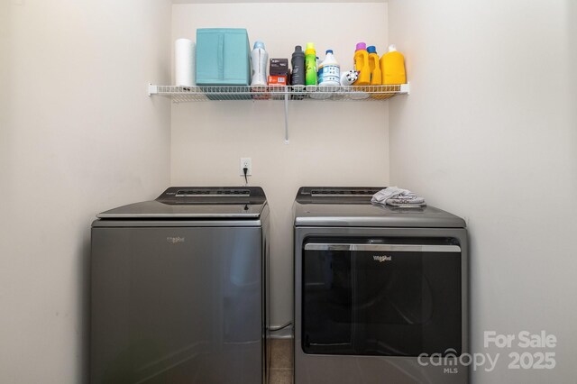 washroom with laundry area and washing machine and clothes dryer