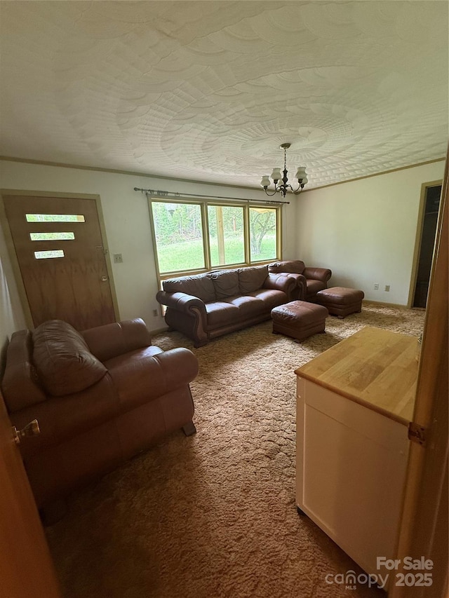living area featuring an inviting chandelier and dark carpet