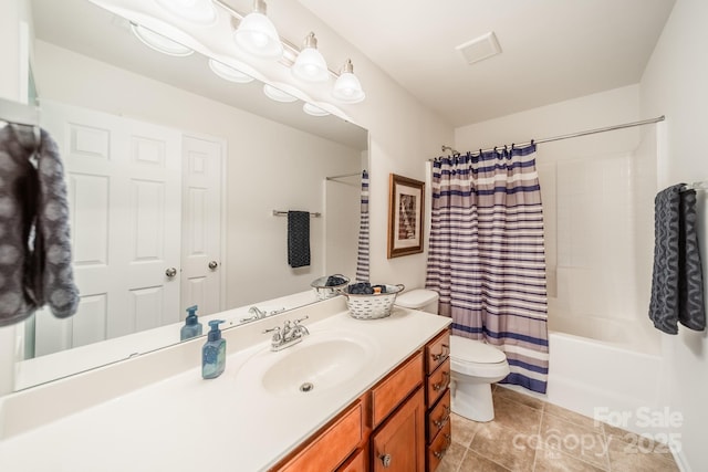 full bath with visible vents, toilet, shower / bath combo with shower curtain, vanity, and tile patterned flooring