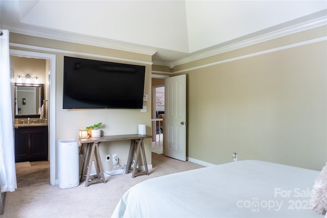 bedroom with light carpet, connected bathroom, and crown molding