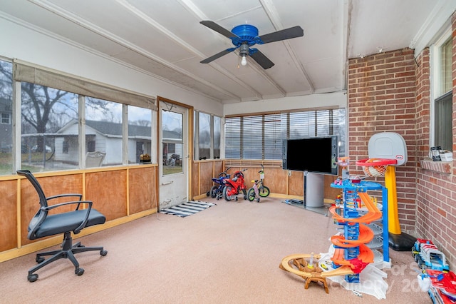 sunroom / solarium with ceiling fan