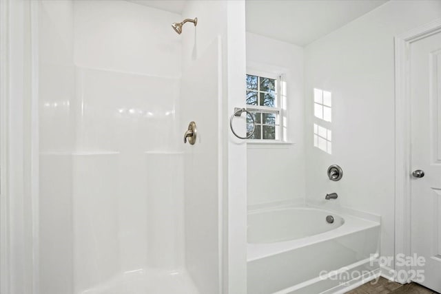 bathroom with shower / bathtub combination