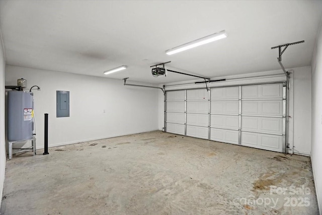 garage featuring water heater, a garage door opener, and electric panel