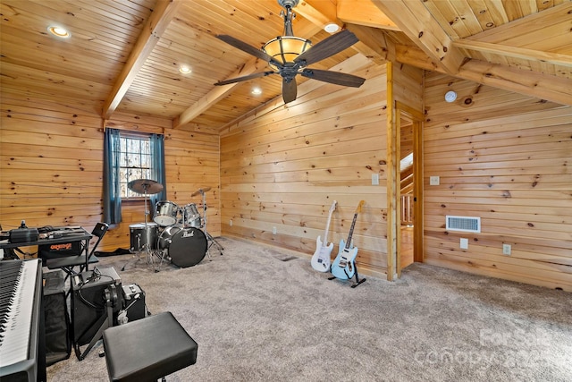 playroom featuring vaulted ceiling with beams, carpet flooring, and wooden walls