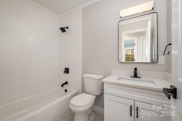 full bathroom featuring vanity, tiled shower / bath, and toilet