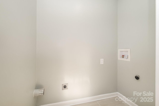 laundry room featuring laundry area, hookup for a washing machine, baseboards, and electric dryer hookup