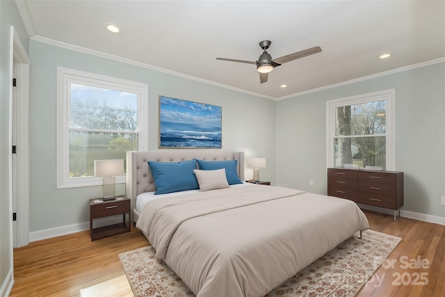 bedroom with ornamental molding, recessed lighting, baseboards, and light wood finished floors