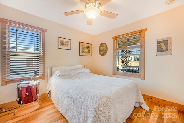 14 Drake St, Asheville, NC 28806 - bedroom with wood finished floors, a ceiling fan, and baseboards