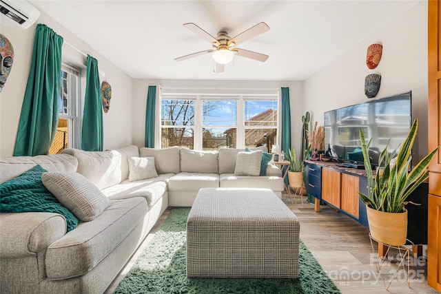 14 Drake St, Asheville, NC 28806 - living room with a ceiling fan, light wood-style floors, and a wall mounted air conditioner