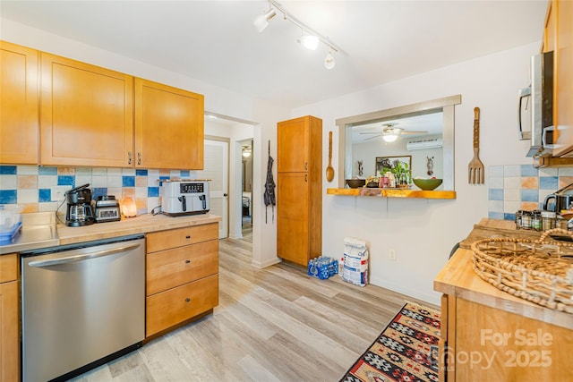 14 Drake St, Asheville, NC 28806 - kitchen with dishwasher, backsplash, butcher block counters, light wood-style floors, and a ceiling fan