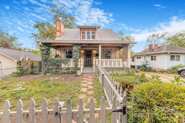 14 Drake St, Asheville, NC 28806 - bungalow-style house with covered porch, a chimney, a gate, and a shingled roof