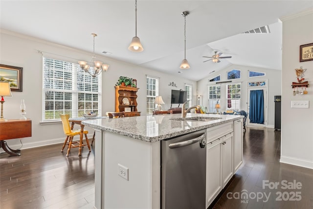 kitchen featuring sink, white cabinetry, light stone countertops, a center island with sink, and stainless steel dishwasher