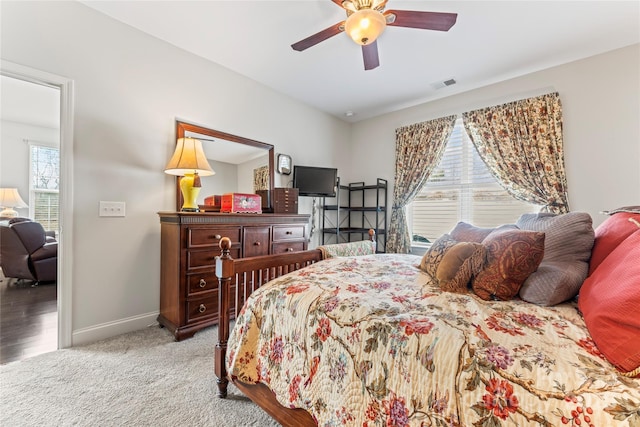 carpeted bedroom featuring ceiling fan