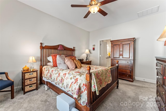 carpeted bedroom featuring ceiling fan