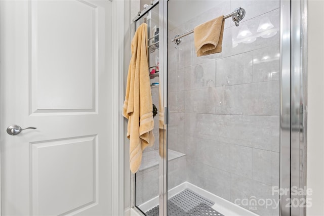 bathroom featuring walk in shower