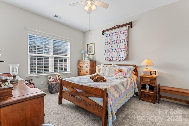 carpeted bedroom with ceiling fan