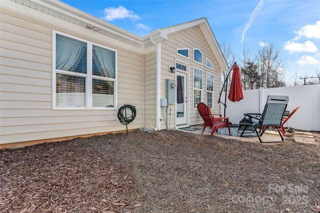 property entrance with a patio