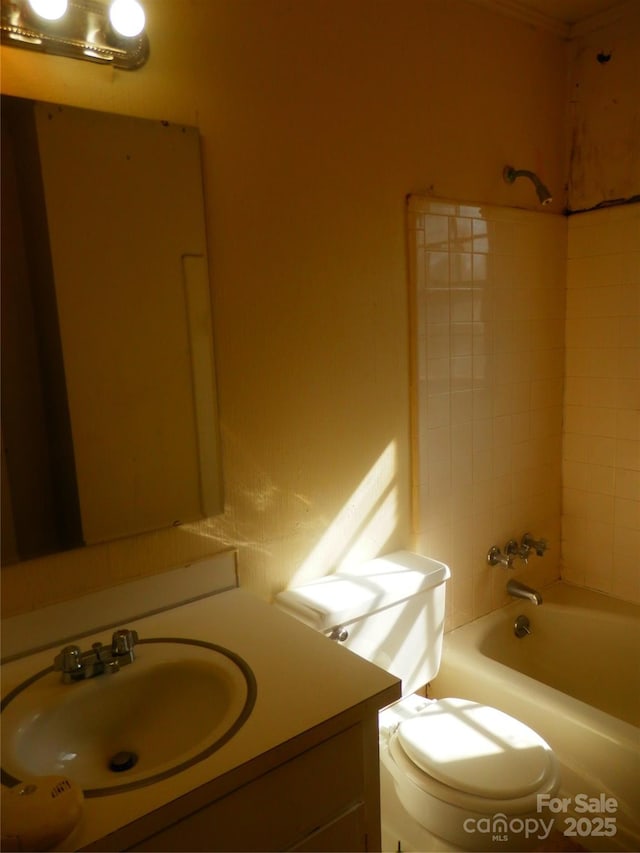 full bathroom featuring toilet and vanity