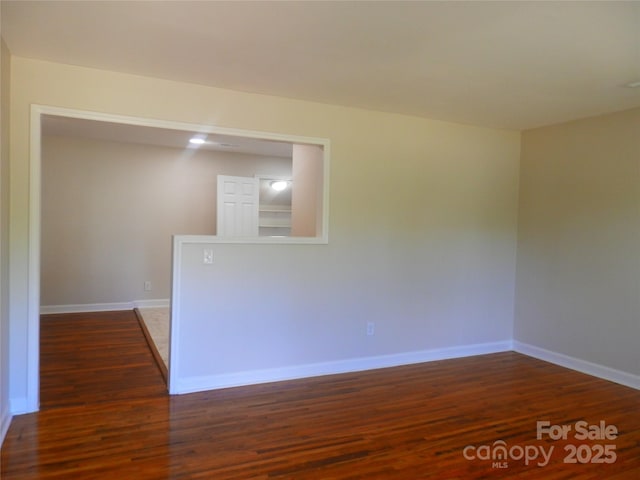 101 Colony Acres Dr, Charlotte, NC 28217 - spare room featuring wood finished floors and baseboards