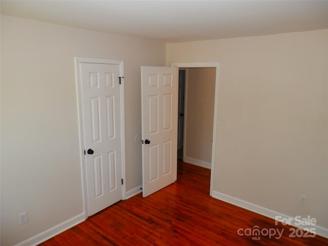 101 Colony Acres Dr, Charlotte, NC 28217 - spare room with wood finished floors and baseboards