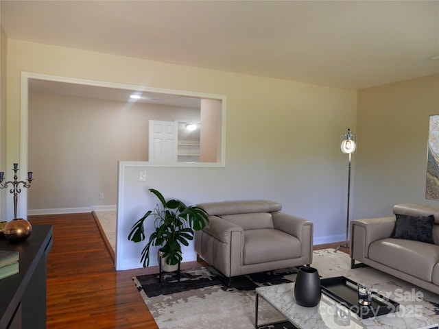 101 Colony Acres Dr, Charlotte, NC 28217 - living room with dark wood-style flooring and baseboards
