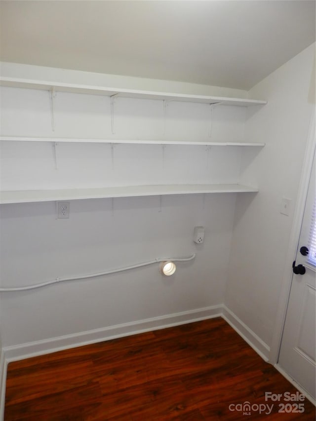 101 Colony Acres Dr, Charlotte, NC 28217 - laundry area featuring baseboards and dark wood finished floors