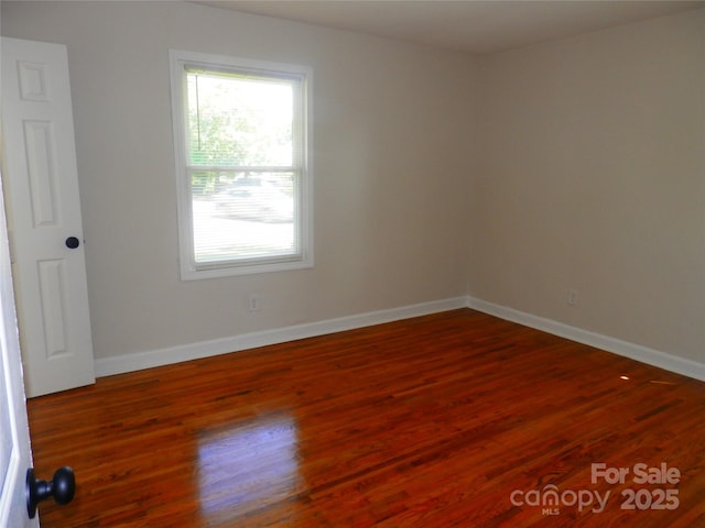 101 Colony Acres Dr, Charlotte, NC 28217 - spare room featuring wood finished floors and baseboards