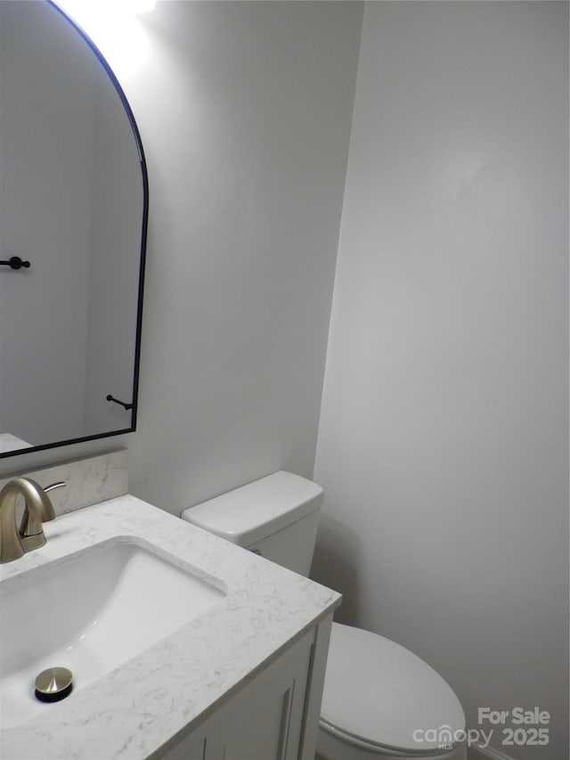 101 Colony Acres Dr, Charlotte, NC 28217 - half bathroom featuring toilet and vanity