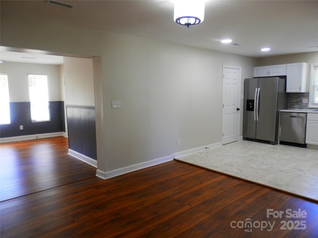 101 Colony Acres Dr, Charlotte, NC 28217 - kitchen featuring stainless steel appliances, wood finished floors, open floor plan, light countertops, and recessed lighting