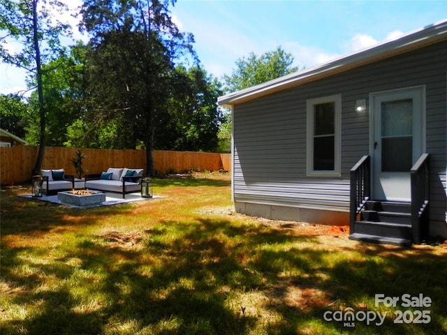 101 Colony Acres Dr, Charlotte, NC 28217 - view of yard with entry steps and an outdoor living space with a fire pit