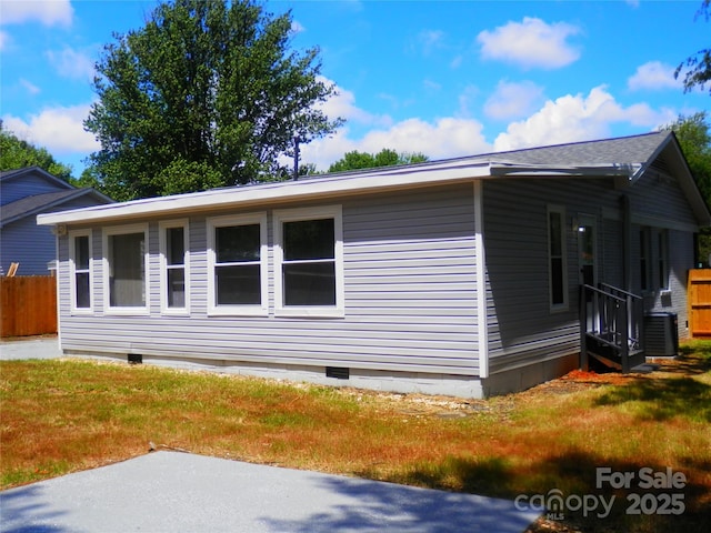 101 Colony Acres Dr, Charlotte, NC 28217 - view of side of property with crawl space, cooling unit, and a patio area