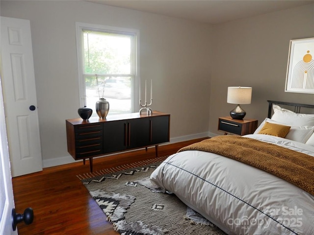 101 Colony Acres Dr, Charlotte, NC 28217 - bedroom featuring baseboards and wood finished floors