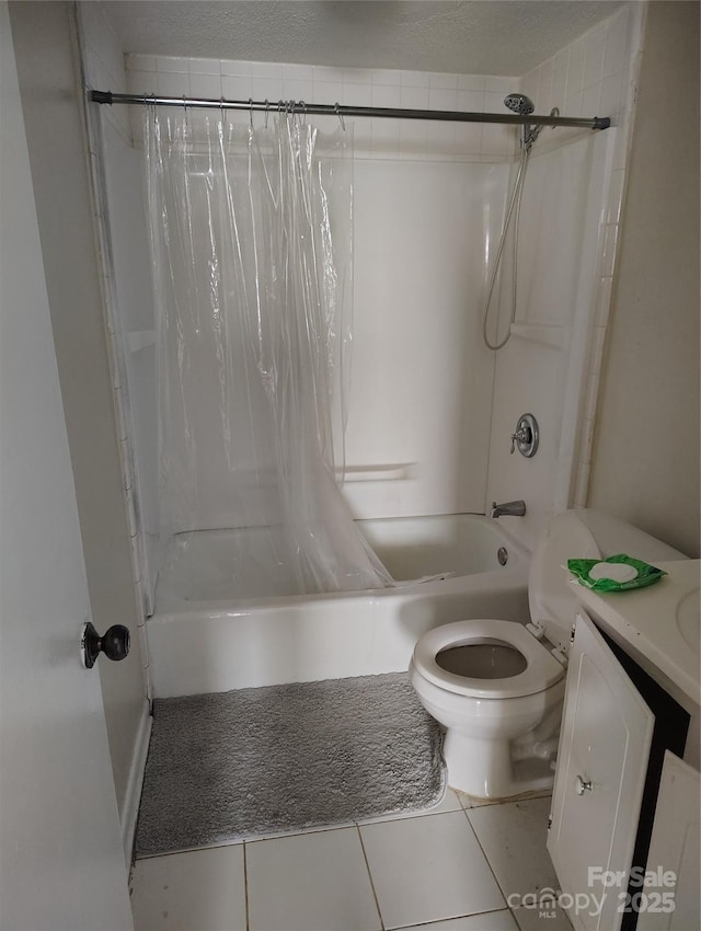 full bathroom featuring shower / tub combo with curtain, vanity, toilet, and tile patterned flooring