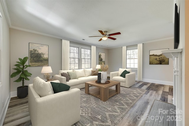 living room featuring hardwood / wood-style flooring, ceiling fan, and ornamental molding