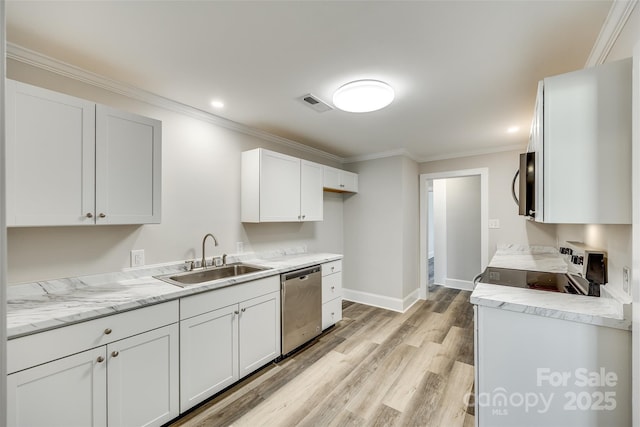 kitchen with sink, white cabinets, ornamental molding, light hardwood / wood-style floors, and stainless steel appliances