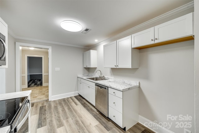 kitchen with appliances with stainless steel finishes, sink, white cabinets, ornamental molding, and light hardwood / wood-style floors