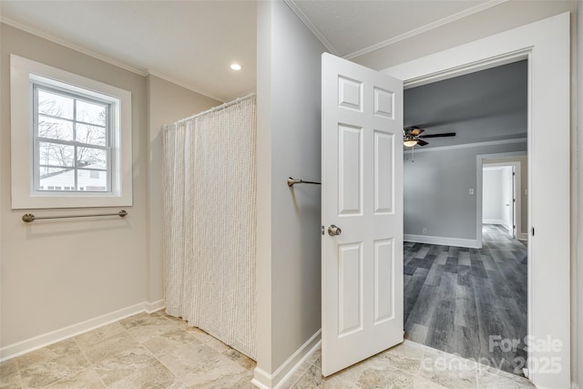 bathroom featuring crown molding and ceiling fan