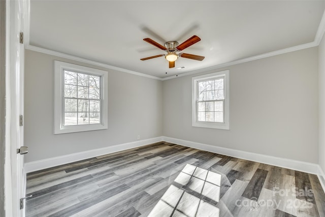 unfurnished room featuring ornamental molding, hardwood / wood-style floors, and ceiling fan