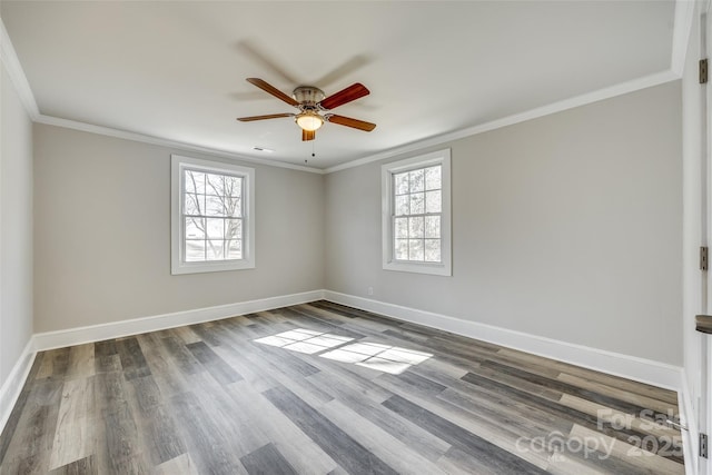 empty room featuring ornamental molding, wood-type flooring, and ceiling fan