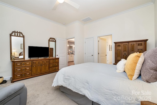 carpeted bedroom featuring crown molding and ceiling fan