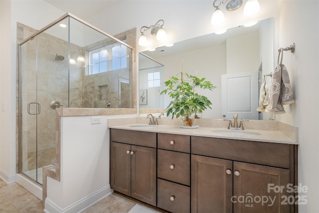 bathroom with an enclosed shower and vanity