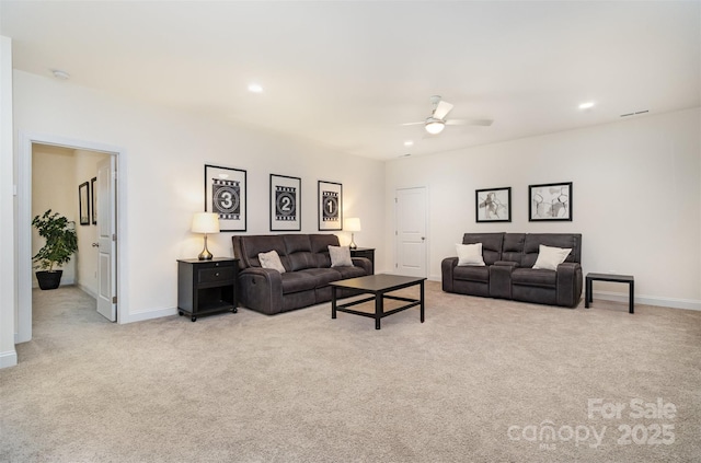 living room with light carpet and ceiling fan