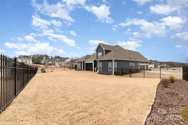 view of yard featuring a garage