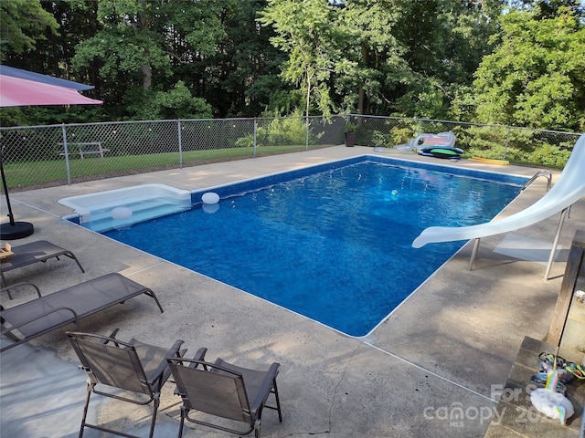 255 Wildwood Rd, Lenoir, NC 28645 - view of pool featuring a fenced in pool, a patio, a fenced backyard, and a water slide