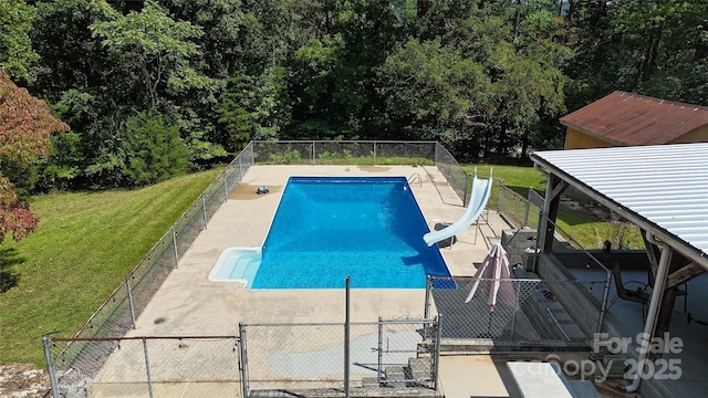 255 Wildwood Rd, Lenoir, NC 28645 - view of swimming pool with a water slide, fence, a patio, and a lawn