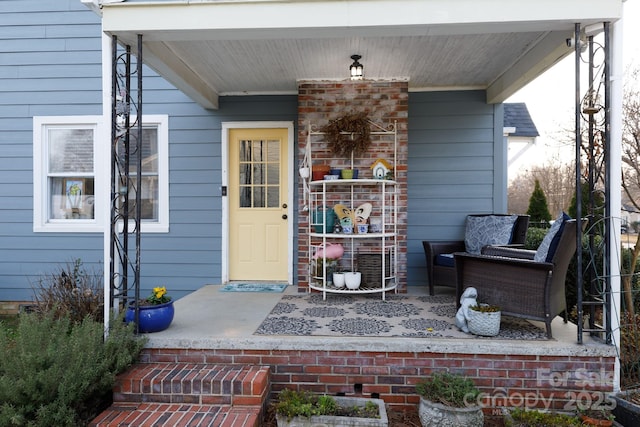 entrance to property with covered porch