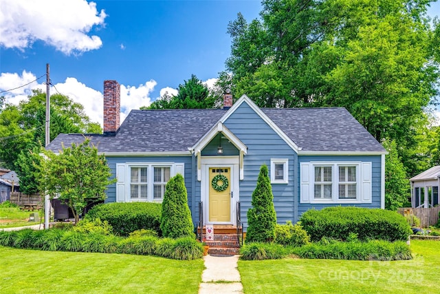 968 Waverly Ave, Rock Hill, SC 29730 - bungalow-style house with a chimney, a front lawn, and roof with shingles