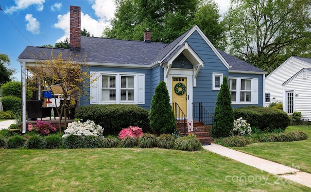 968 Waverly Ave, Rock Hill, SC 29730 - bungalow with a chimney, a front lawn, and roof with shingles