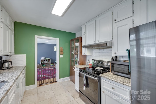 968 Waverly Ave, Rock Hill, SC 29730 - kitchen featuring stainless steel appliances, under cabinet range hood, white cabinetry, and backsplash